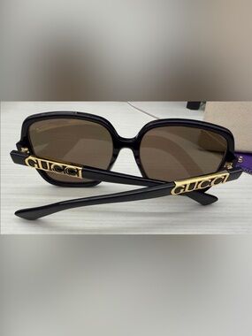 Gucci Black Sunglasses with large Gold Gucci Logo and Burgundy Pouch & box